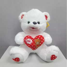 Игрушка мягкая Мишка с сердцем от интернет-магазина «Цветочные истории»